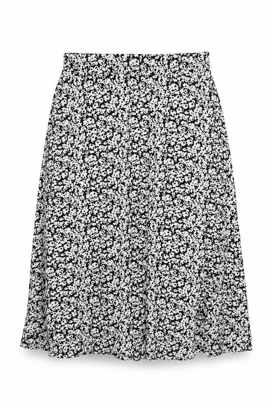 Front view of Marks & Spencer women’s white floral viscose swing skirt, size UK 14