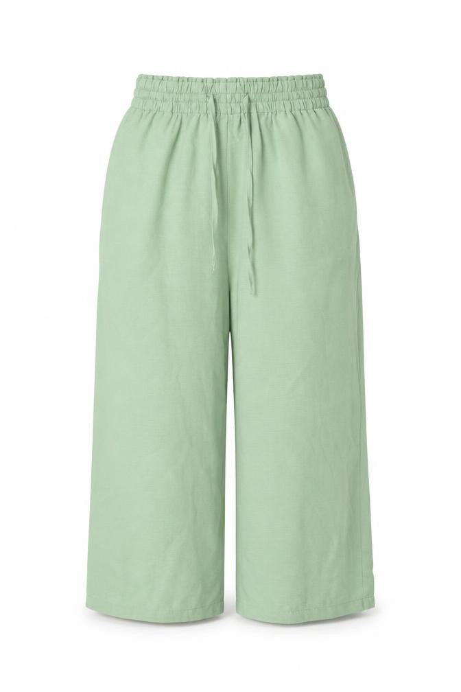 Front view of Stradivarius women’s green polyester trousers, size L, 21.5-inch leg regular drawstring