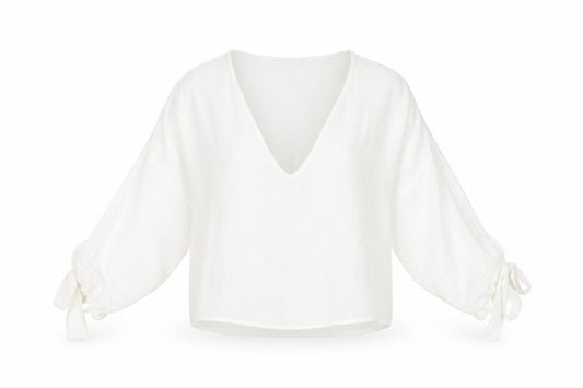 Front view of Zara women’s white polyester basic t-shirt, size S, v-neck