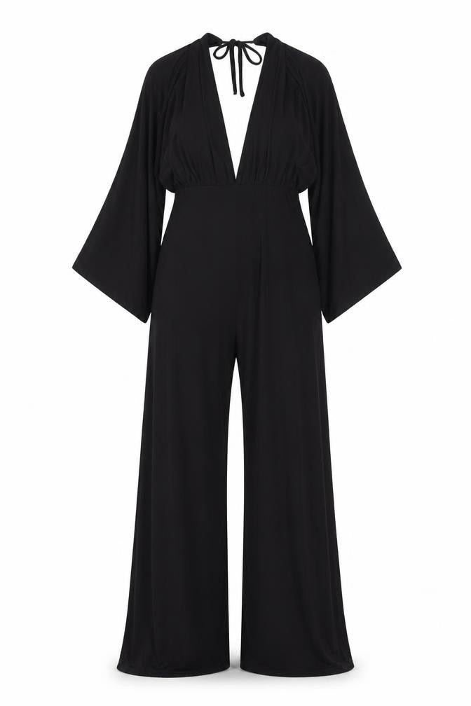 Front view of PRETTYLITTLETHING women’s black polyester jumpsuit one-piece, size UK 12, 31-inch leg tie