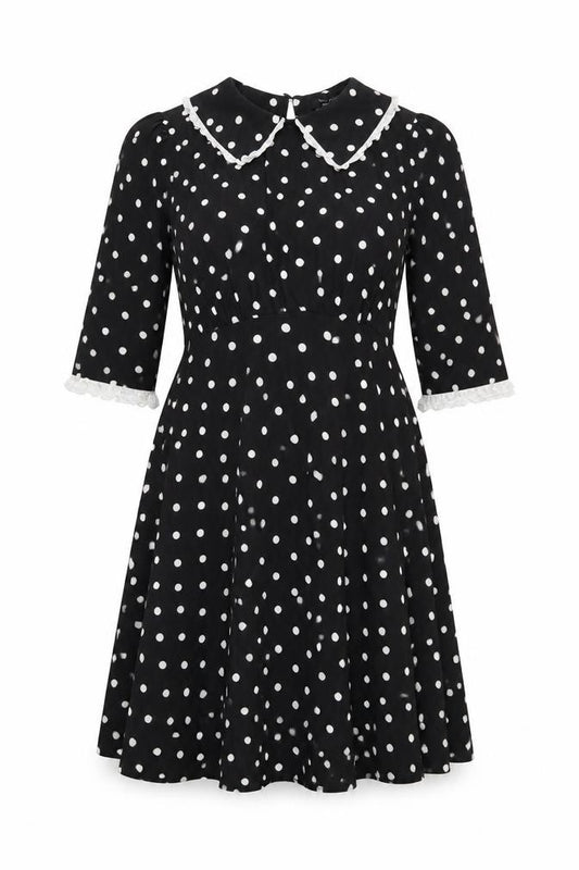 Front view of New Look women’s black polka dot polyester a-line, size UK 12, collared zip