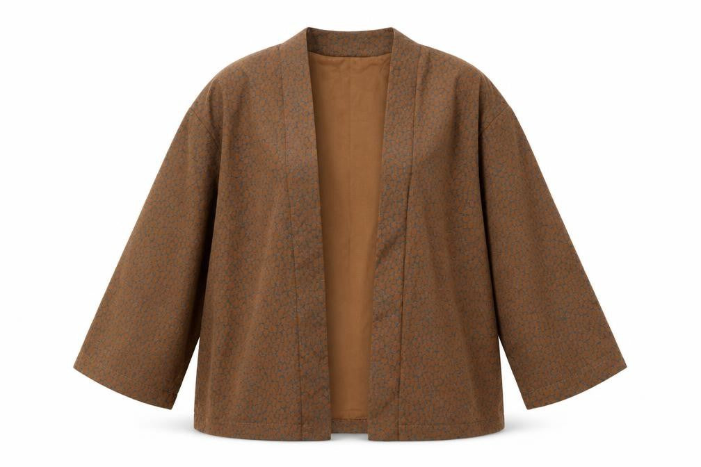 Front view of QuZu women’s brown geometric jacket, size UK 12