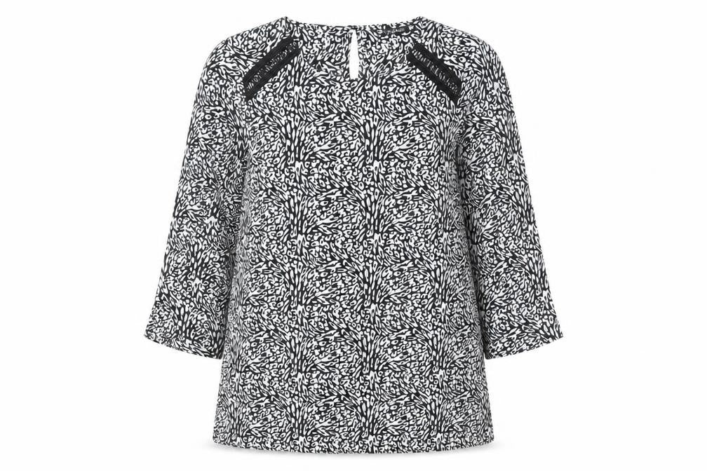 Front view of Dunnes women’s ivory geometric polyester tunic blouse, size XS, round neck