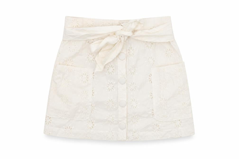 Front view of ASOS women’s white floral cotton mini skirt, size UK 8, button