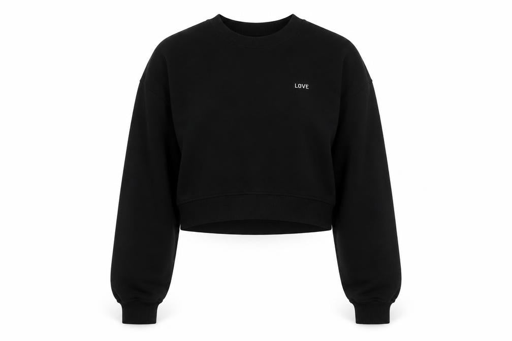 Front view of Divided by H&M women’s black cotton pullover sweatshirt, size S, pullover - love