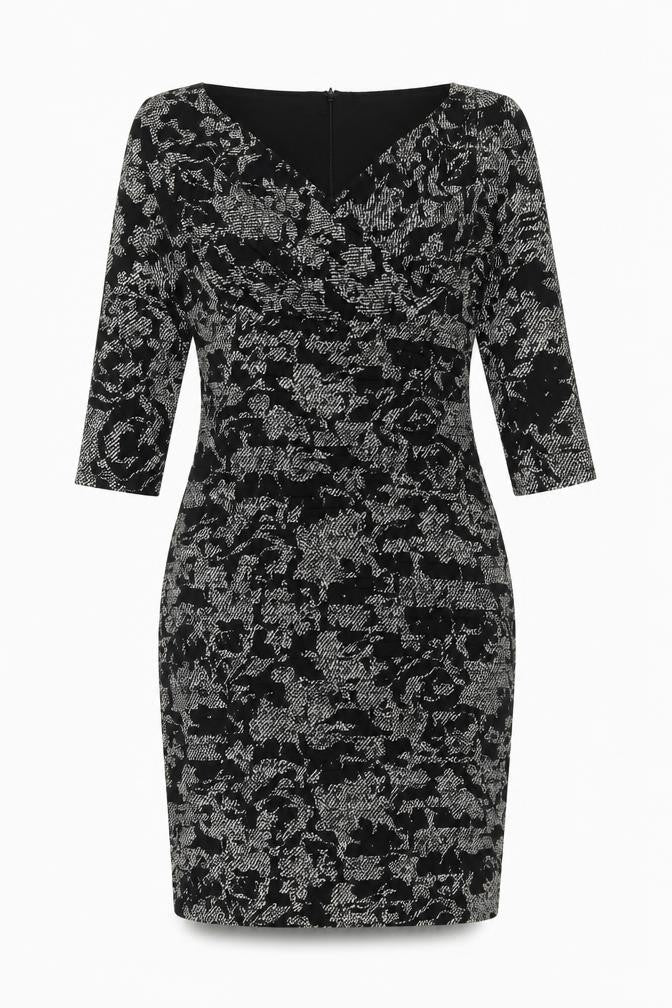 Front view of Country Casuals women’s black geometric polyester bodycon, size UK 14, v-neck zip