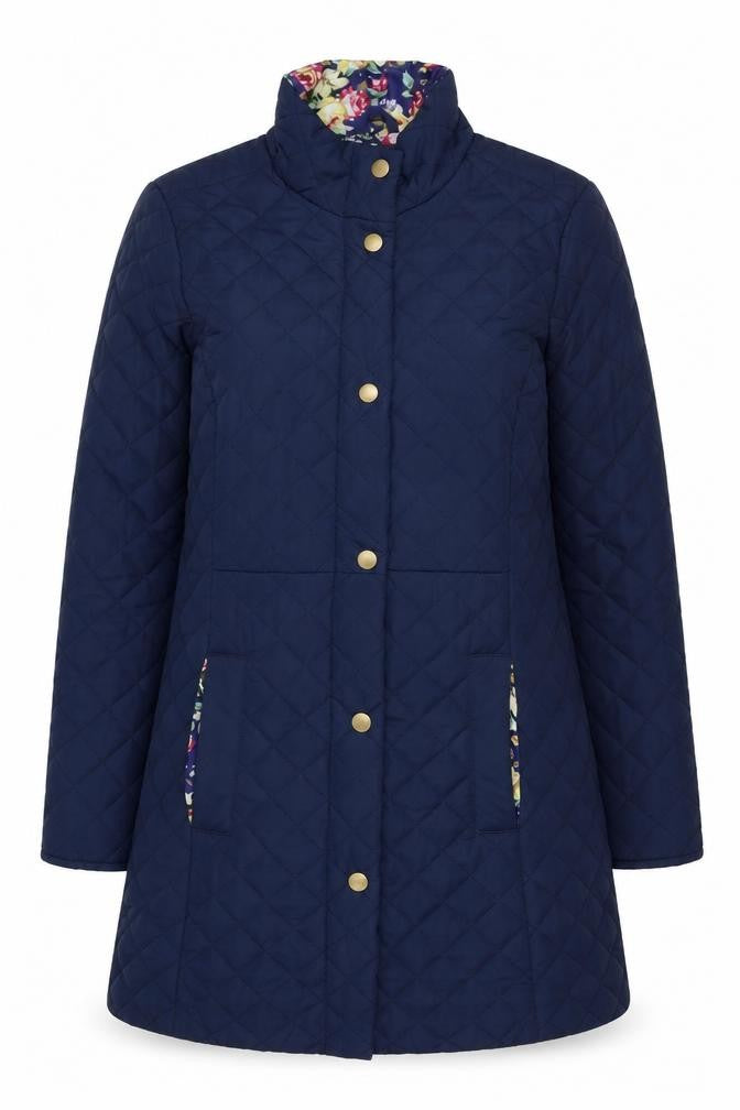 Front view of Betty Kay women’s blue quilted jacket, size UK 12, snap