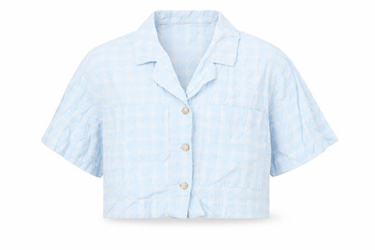 Front view of Topshop women’s blue plaid cotton cropped button-up, size UK 12, collared