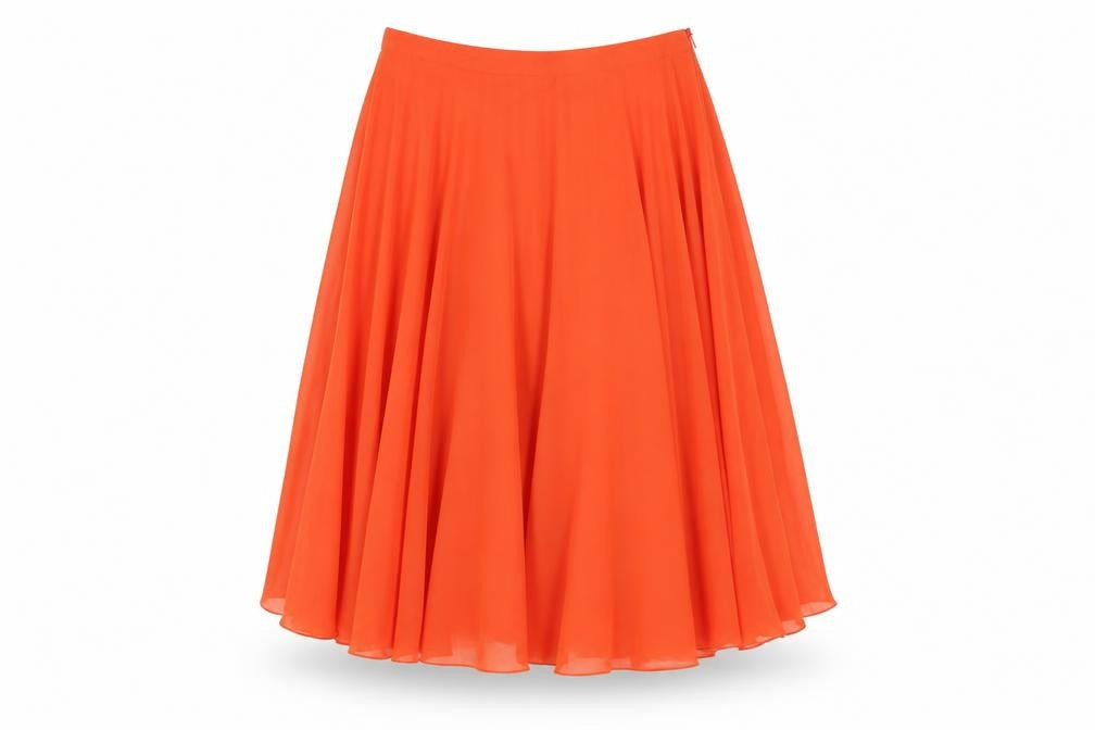 Front view of New Look women’s red polyester pleated skirt, size UK 10, zip