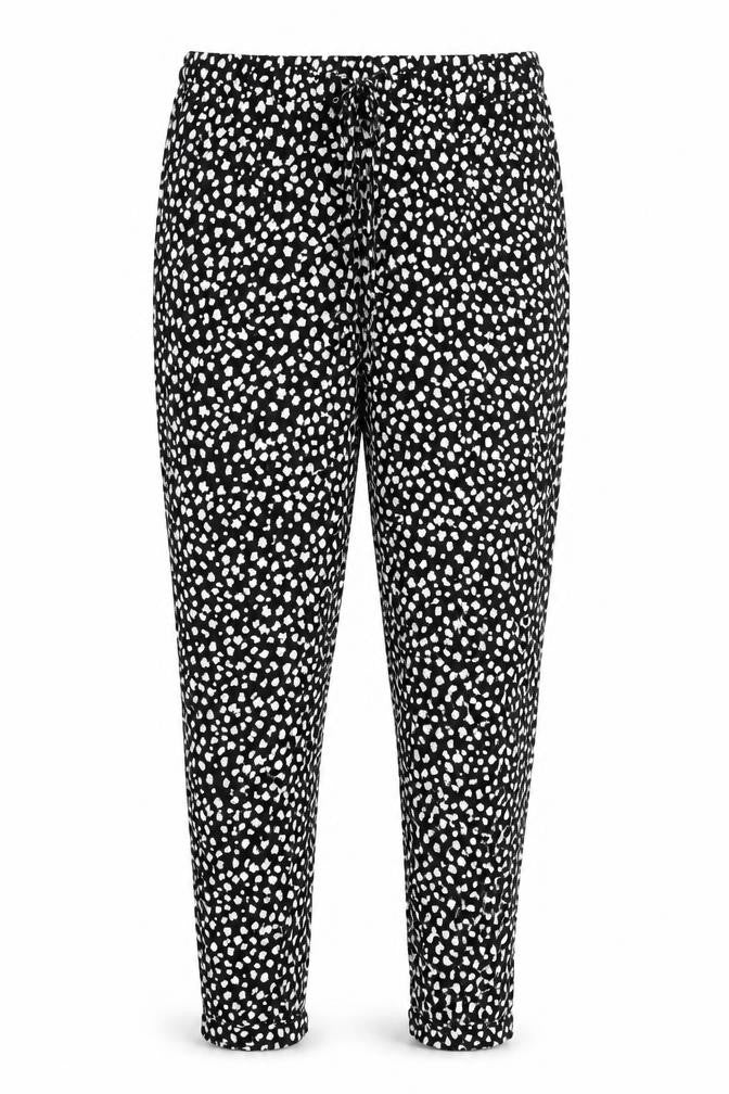 Front view of Marks & Spencer women’s black geometric viscose trousers, size UK 10, 29-inch leg regular drawstring