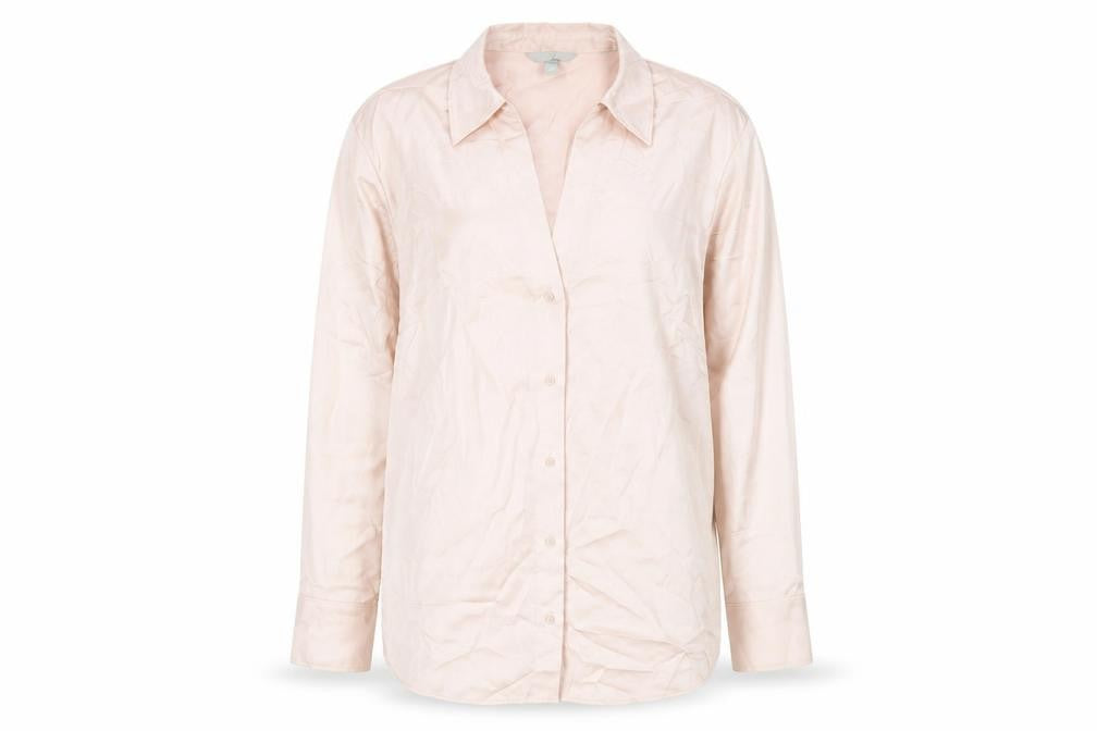 Front view of H&M women’s pink polyester basic button-up, size XL, collared