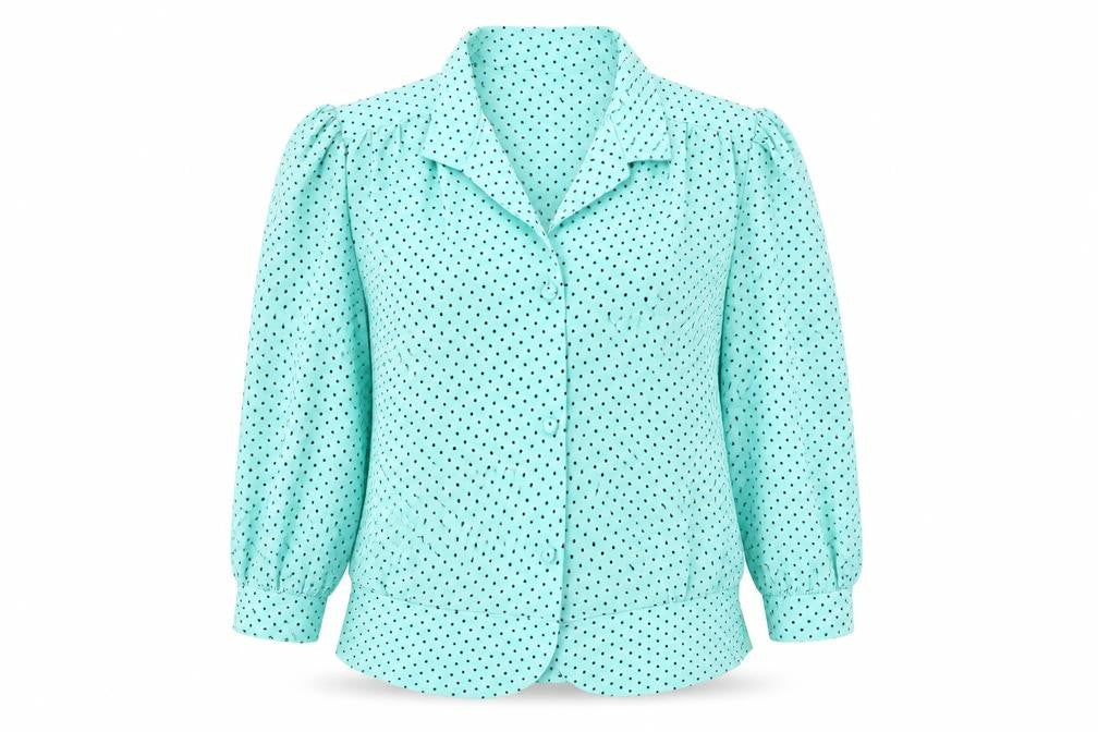 Front view of Berkertex women’s green polka dot polyester tunic blouse, size UK 14, collared