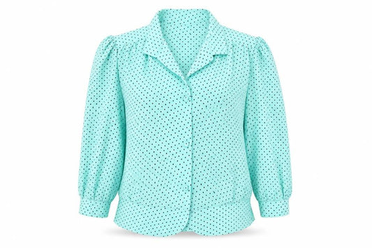 Front view of Berkertex women’s green polka dot polyester tunic blouse, size UK 14, collared