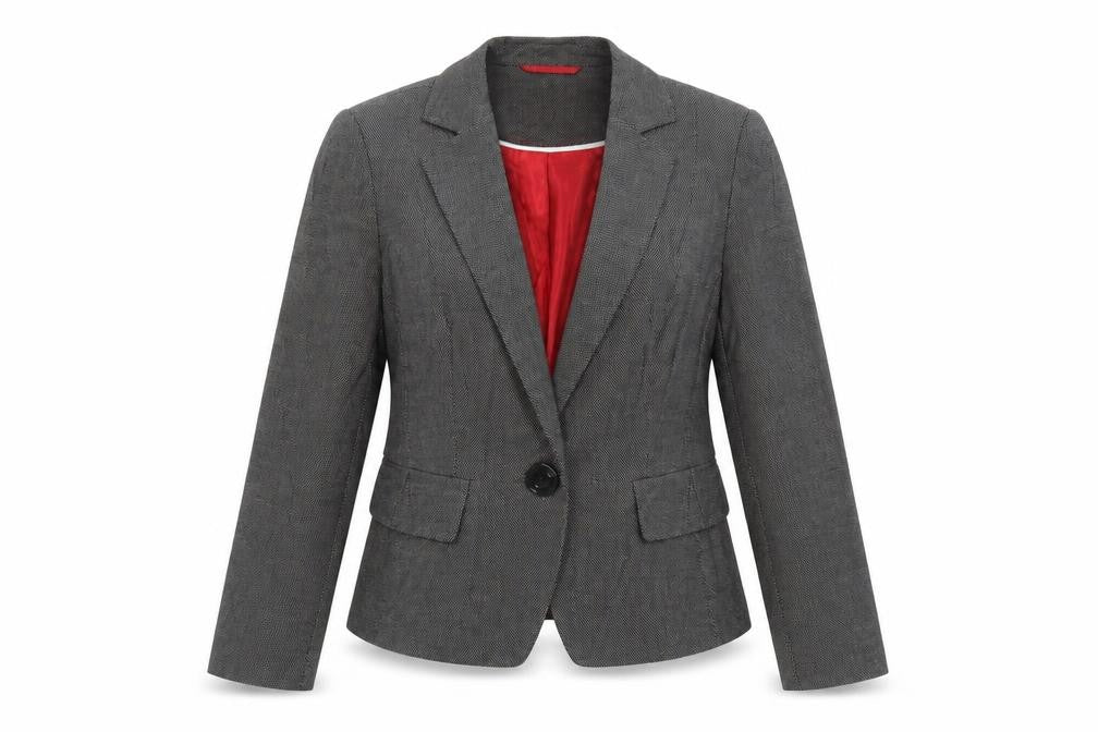 Front view of Marks & Spencer women’s black polka dot jacket blazer, size UK 12, button