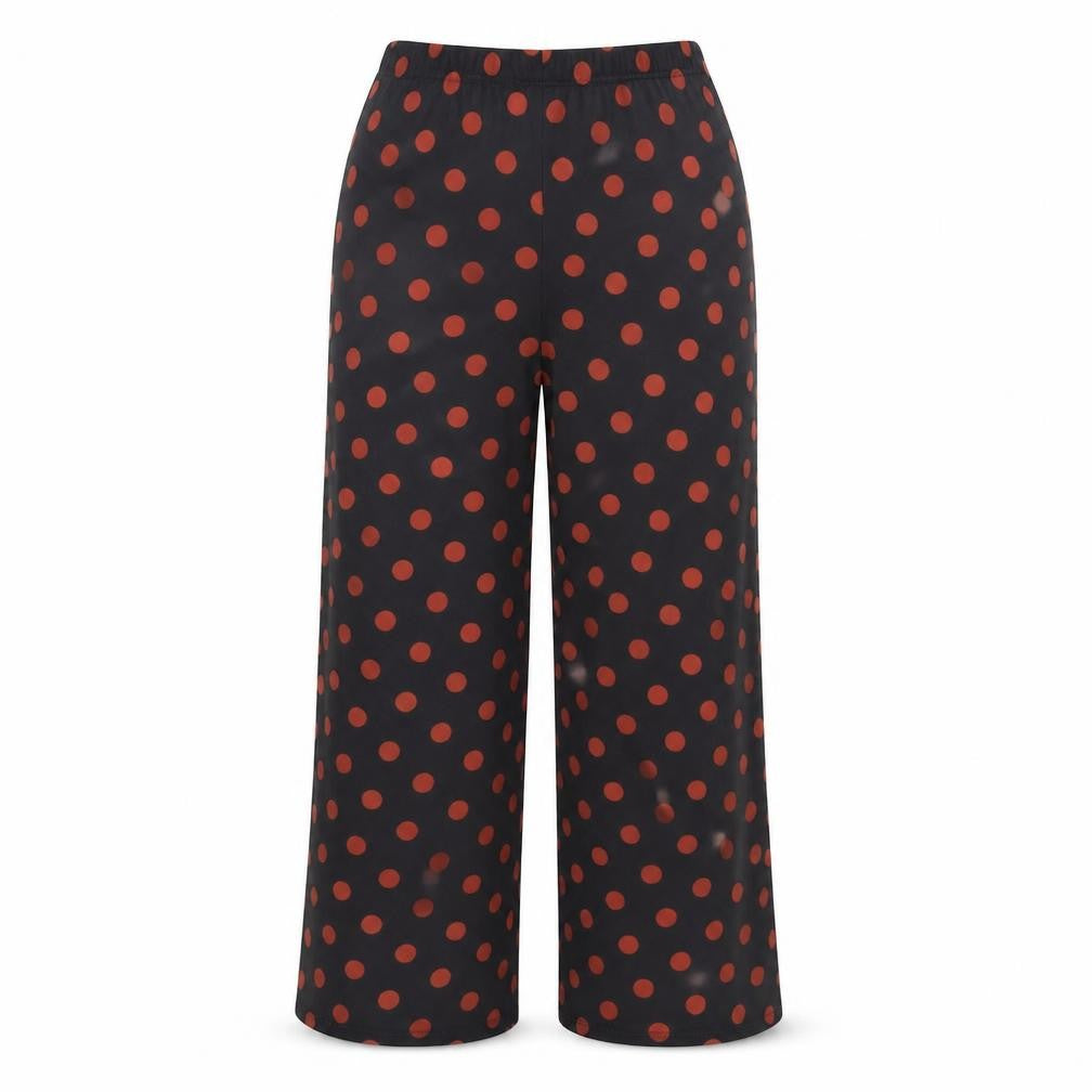 Front view of New Look women’s black polka dot polyester trousers, size UK 8, 25-inch leg regular