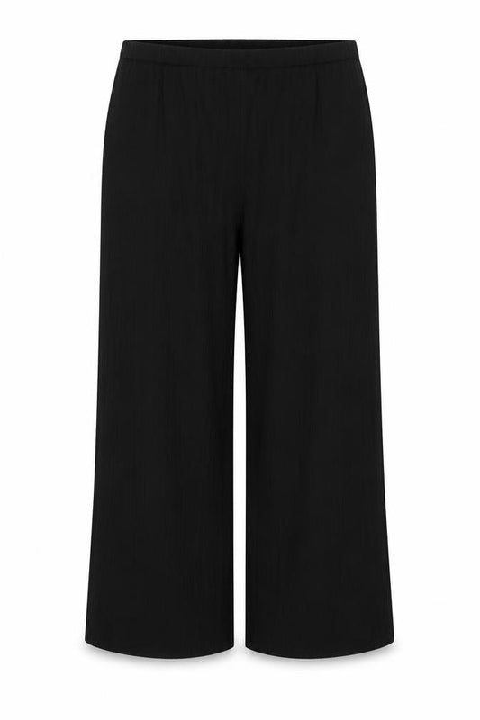 Front view of ASOS women’s black polyester trousers, size UK 16, 21-inch leg regular