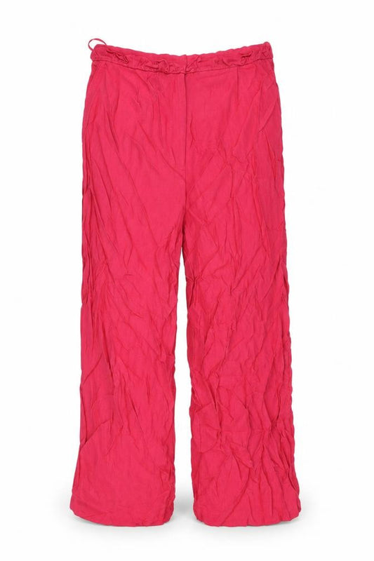 Front view of Next women’s pink viscose trousers, size UK 12, 22-inch leg regular zip