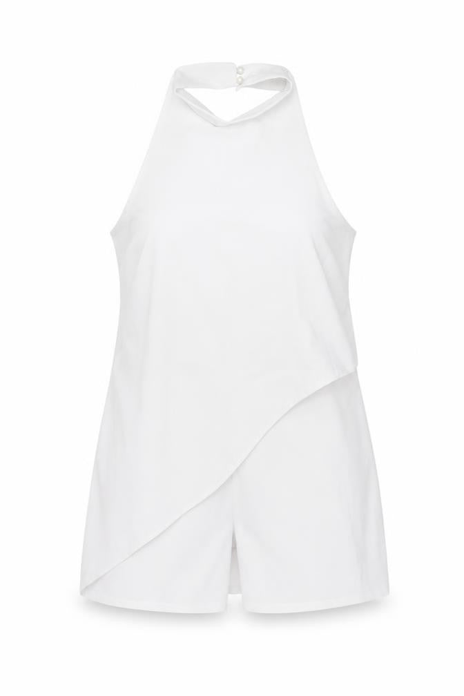 Front view of PRETTYLITTLETHING women’s white polyester playsuit one-piece, size UK 14, 3-inch leg button