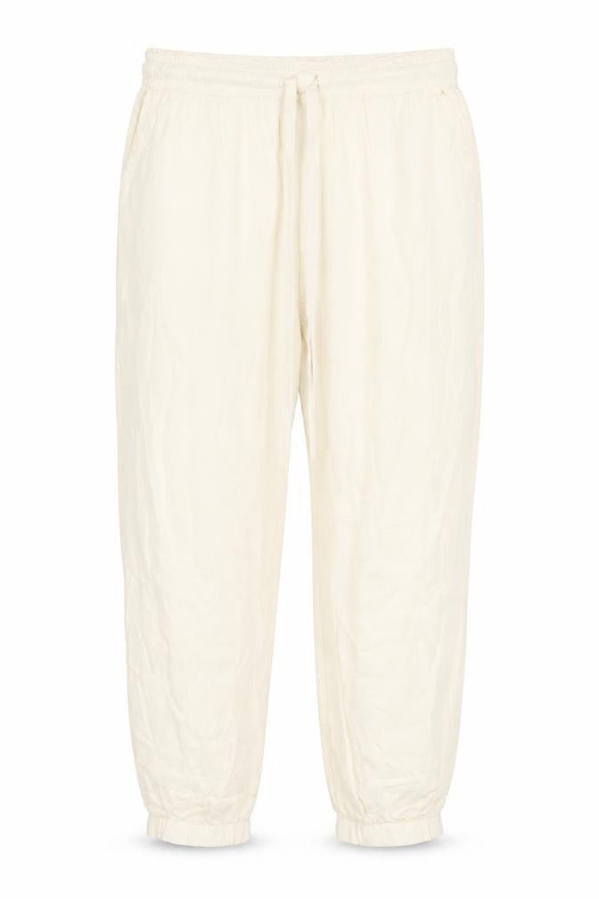 Front view of Teoh & Lea women’s ivory viscose trousers, size M, 25-inch leg regular drawstring