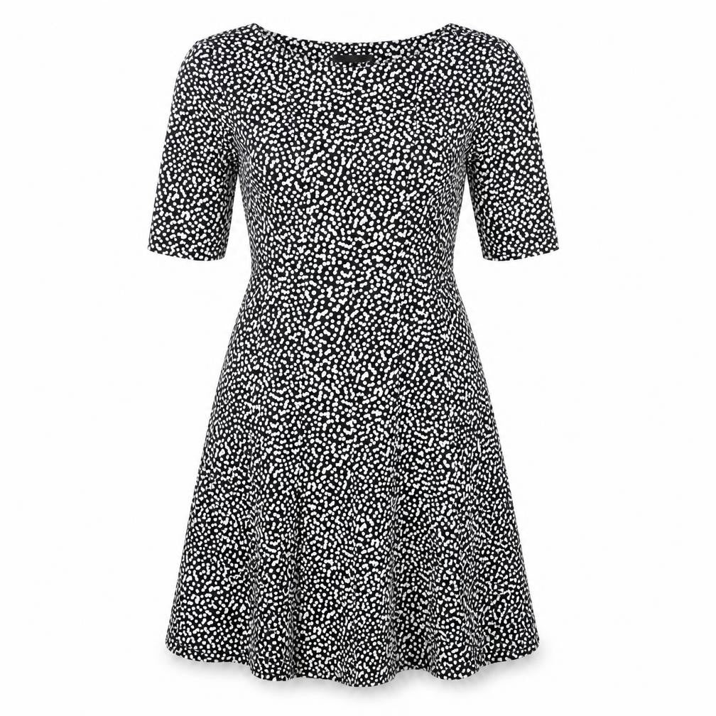 Front view of Connected Apparel women’s black polka dot polyester a-line, size UK 10, boat neck