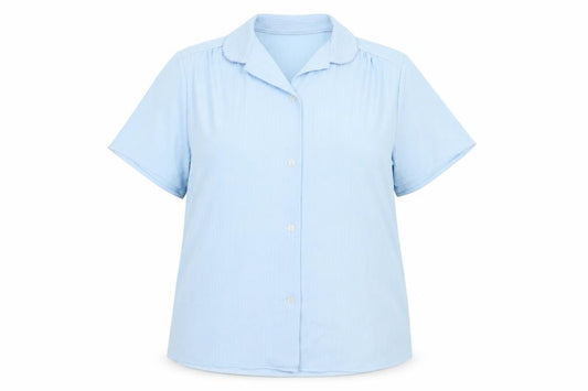 Front view of Trevira women’s blue polyester basic button-up, size UK 16, collared