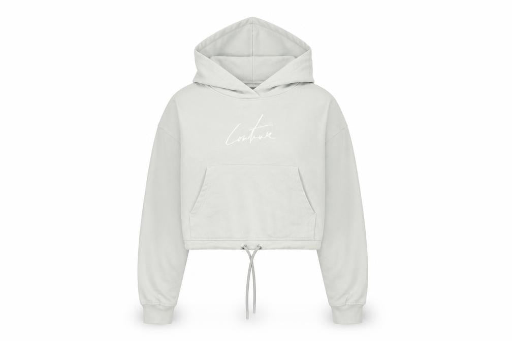 Front view of Couture women’s green cotton pullover hoodie, size M, pullover