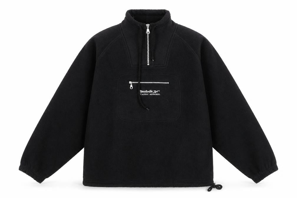Front view of Reebok women’s black polyester pullover sweatshirt, size UK 10, zip - reebok classic apparel