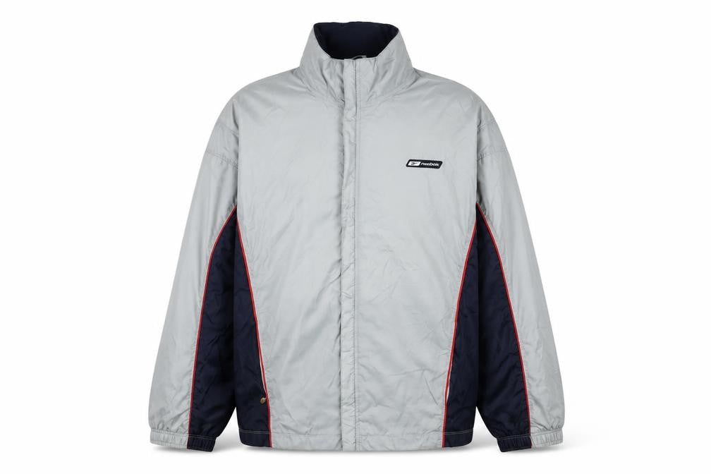 Front view of Reebok men’s blue jacket, size XL, zip - logo