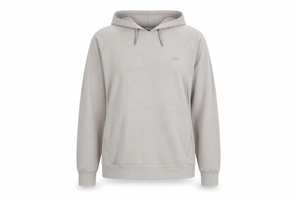 Front view of Myprotein women’s beige polyester pullover hoodie, size M, pullover - logo pockets