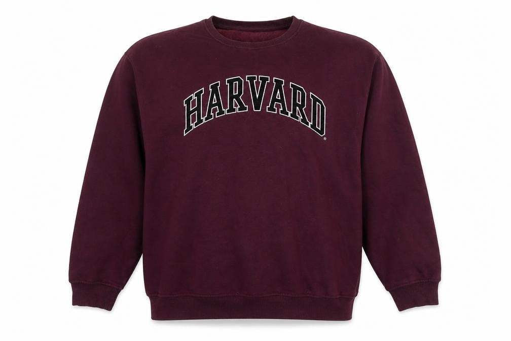 Front view of Harvard men’s purple cotton pullover sweatshirt, size M, - logo