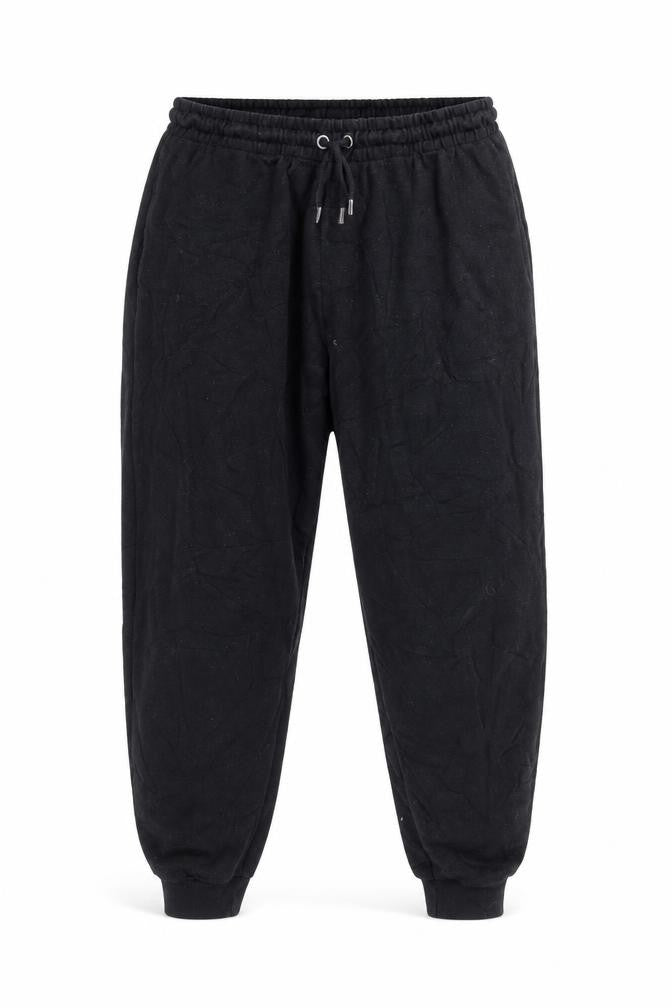 Front view of Boohoo men’s black polyester jogger trousers, size XL, 27-inch leg regular drawstring - elasticated waist