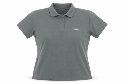 Front view of Reebok women’s green cotton basic polo, size UK 12, collared