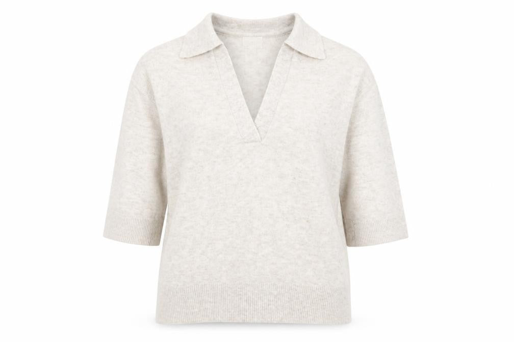 Front view of H&M women’s beige v-neck polyester jumper, size XS