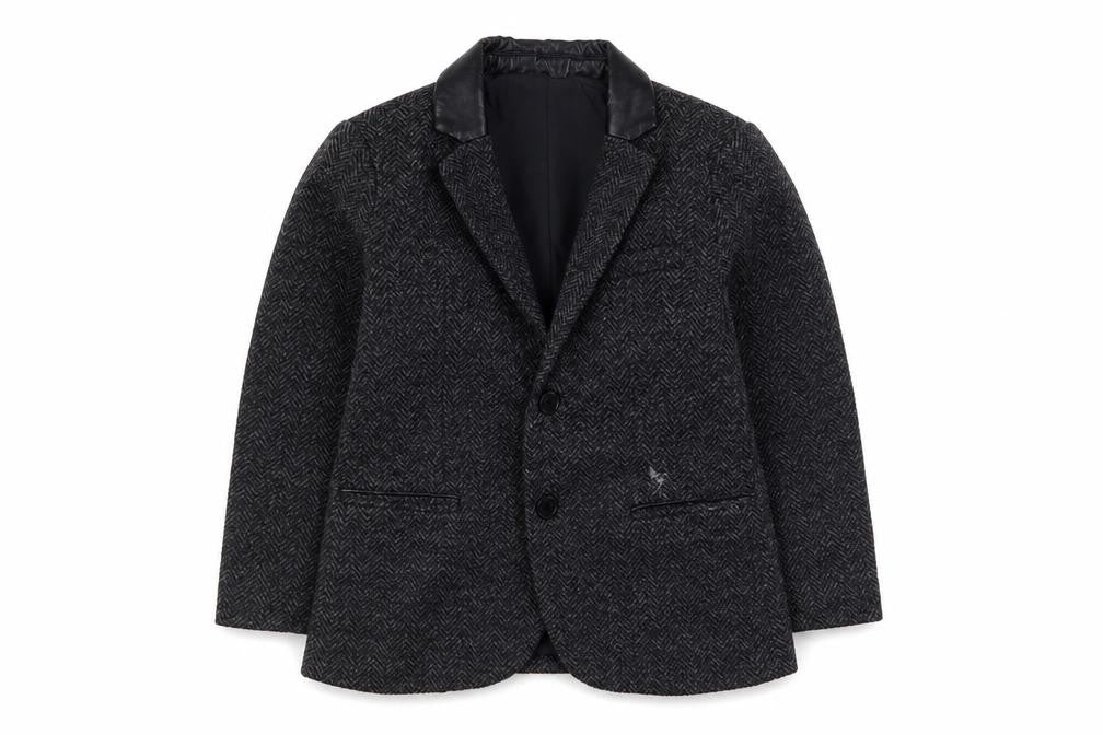 Front view of Zara boys’ black suit jacket 6 years wool herringbone classic