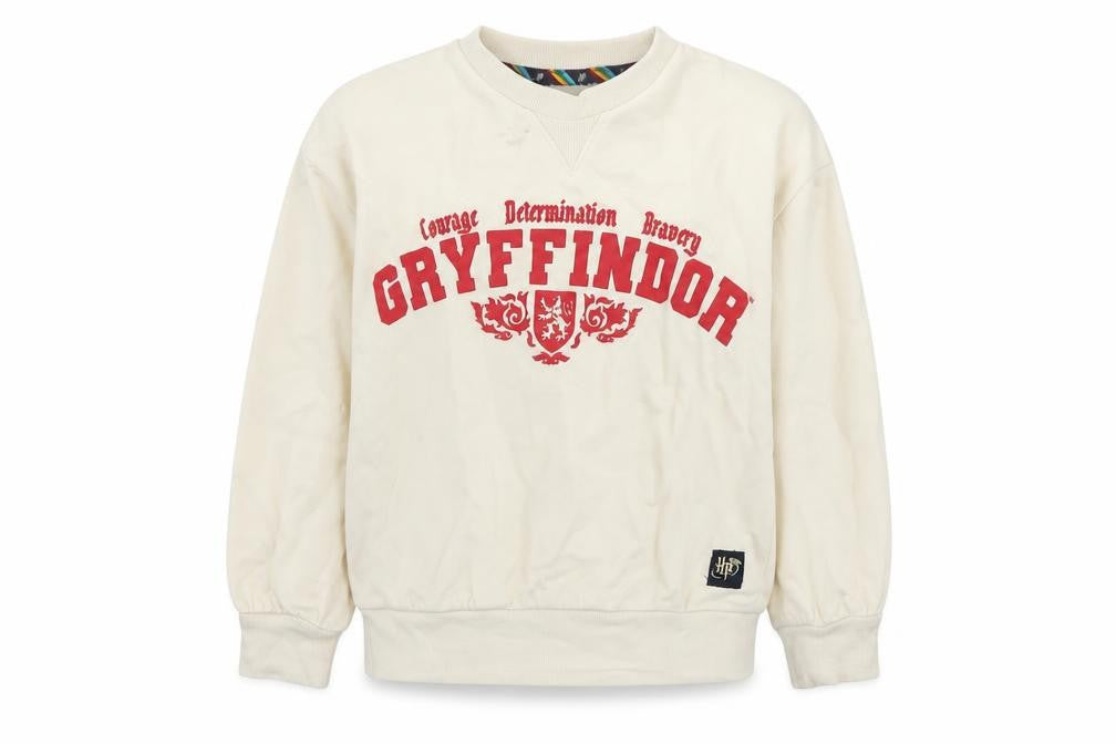 Front view of Harry Potter girls’ ivory gryffindor pullover sweatshirt 7-8 years