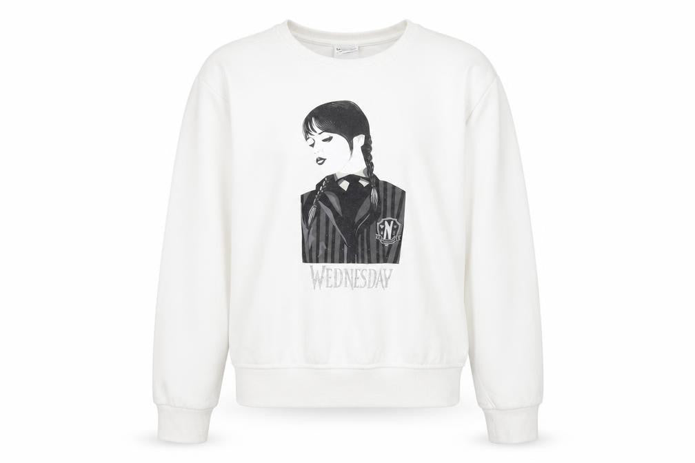 Front view of Wednesday girls’ white graphic pullover sweatshirt