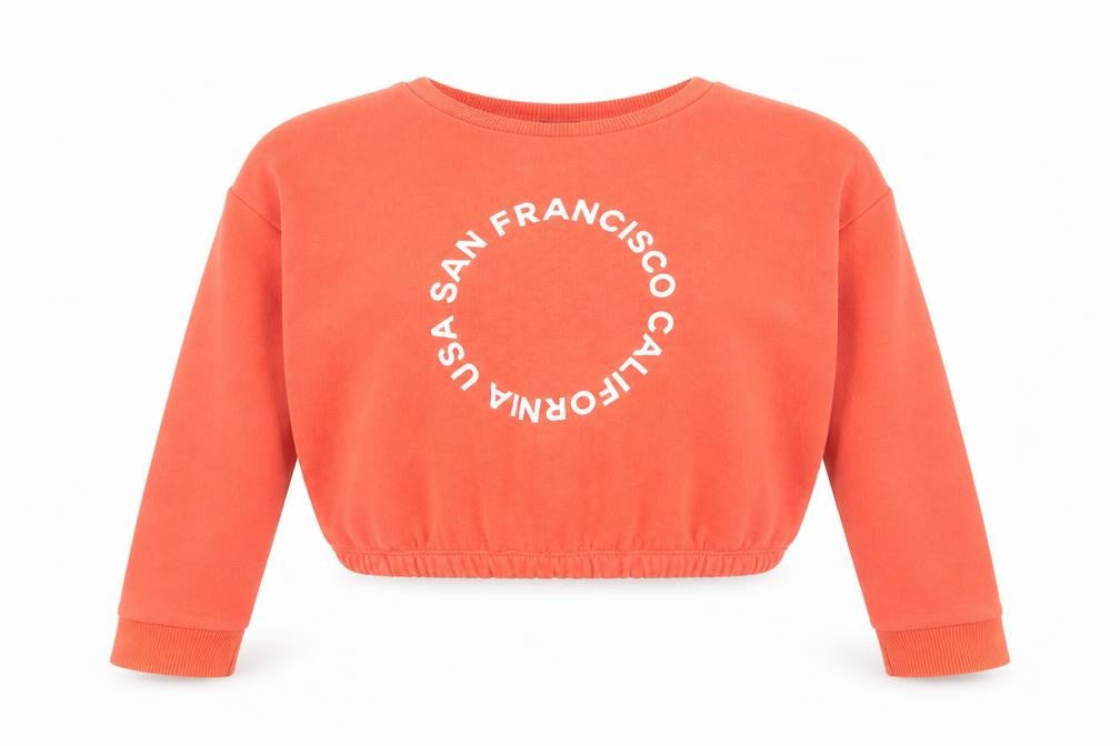 Front view of New Look girls’ red pullover sweatshirt, size 12-13, usa graphic