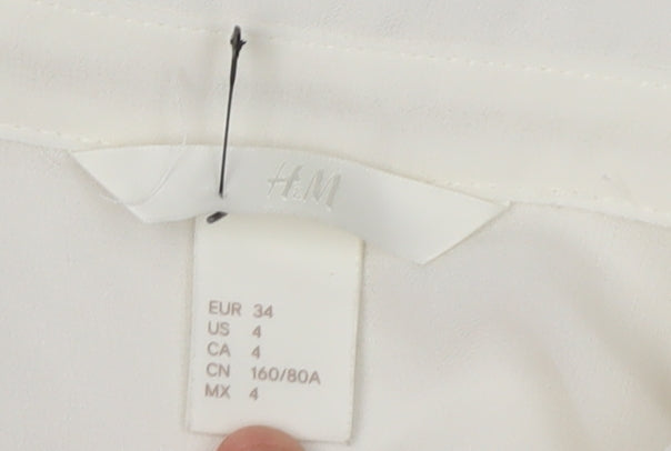 H&M Women's White Sleeveless Button-Up Blouse - Size 6