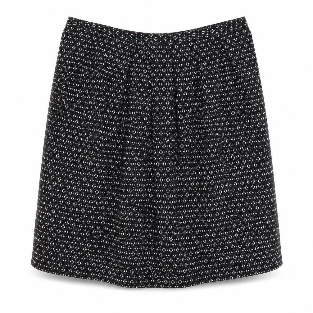 Front view of DAKS Women's Black Geometric Skirt, size 14, Elegant Style