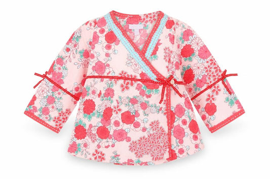 Front view of Monsoon girls’ pink floral wrap blouse 12-18 months