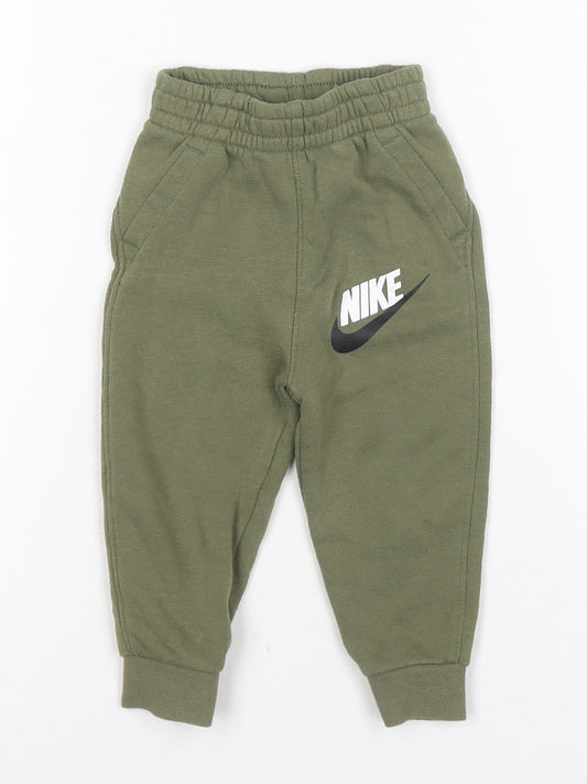 Front view of Nike unisex baby green jogger trousers, 12 months