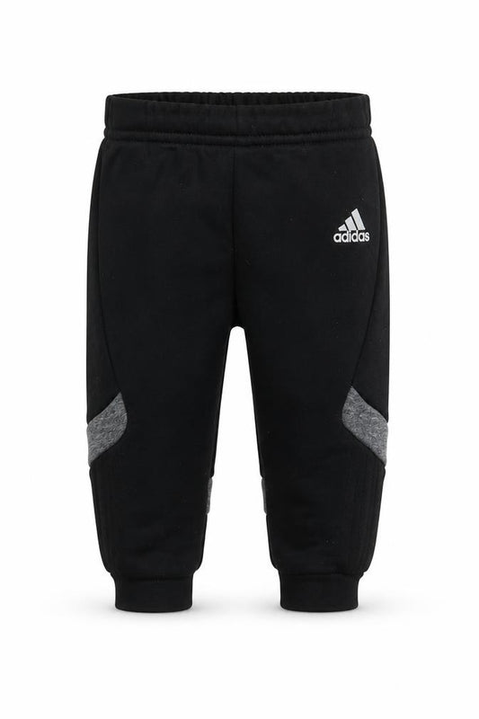Front view of Adidas unisex baby black jogger trousers 9-12 months