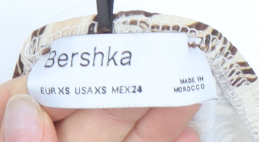 Bershka Women's Brown Geometric Flared Trousers 2XS