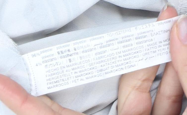 Bershka Women's Brown Geometric Flared Trousers 2XS