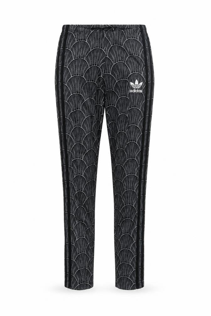 Front view of Adidas Women's XS Black Track Pants with Geometric Pattern