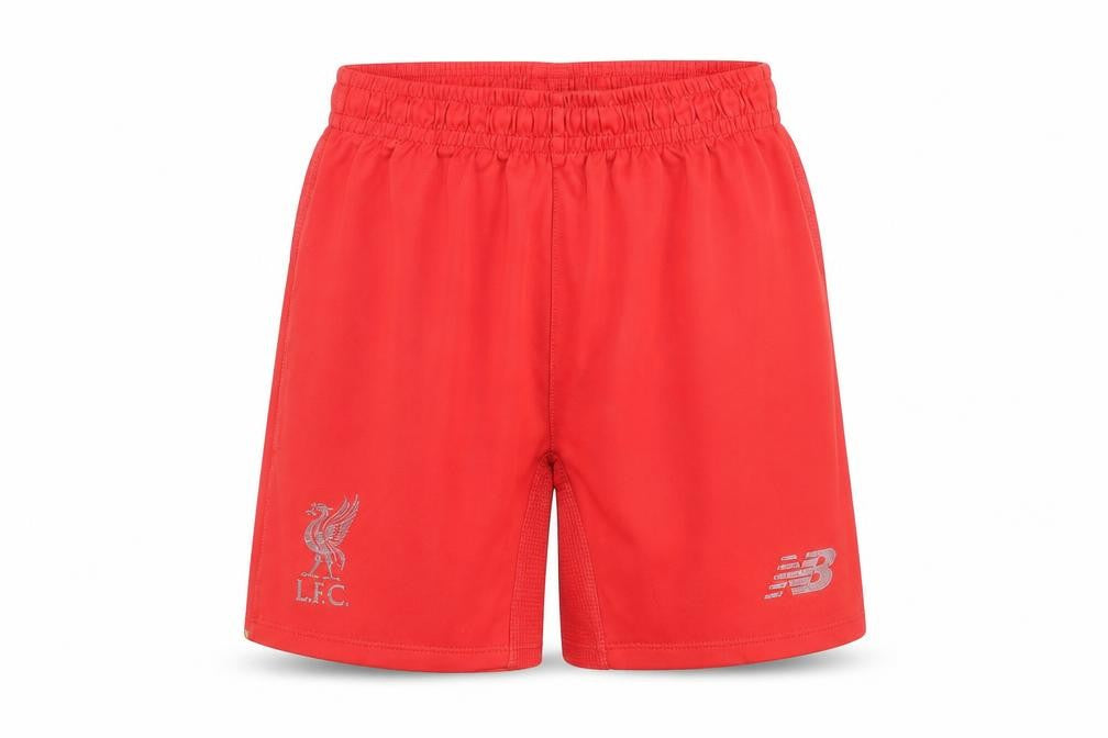 Front view of New Balance boys’ red athletic shorts - 7-8 years