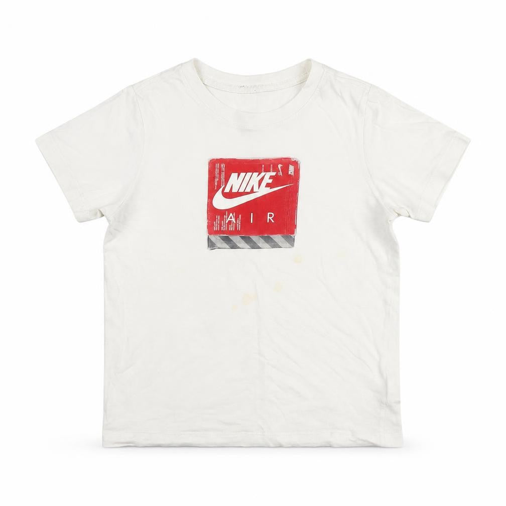 Front view of Nike boys’' white graphic print t-shirt, size S, casual style