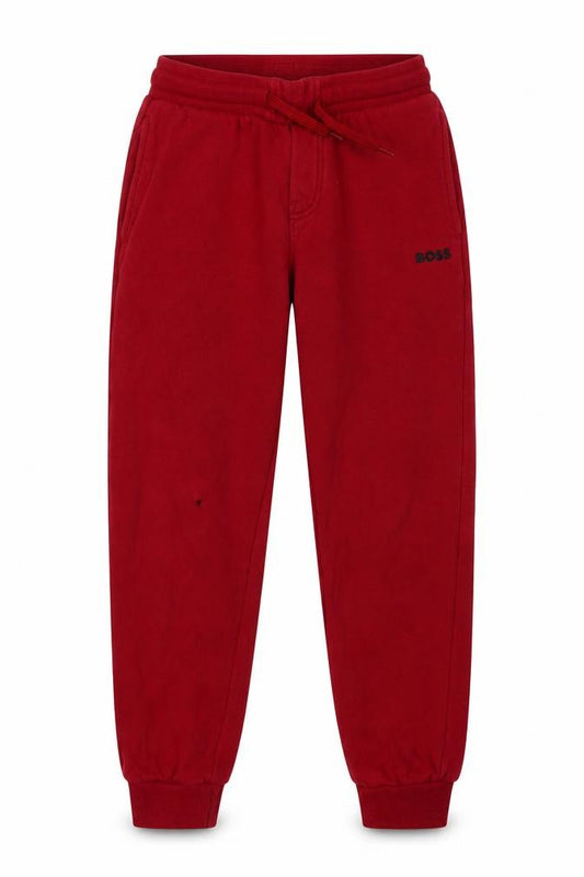 Front view of BOSS boys’ red jogger trousers, size 8