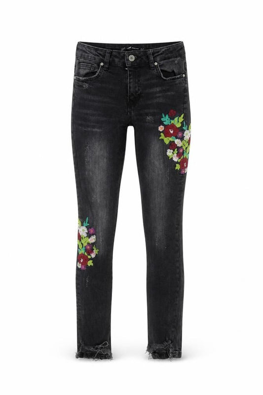 Front view of Zara girls’ black floral embroidered skinny jeans, size 6