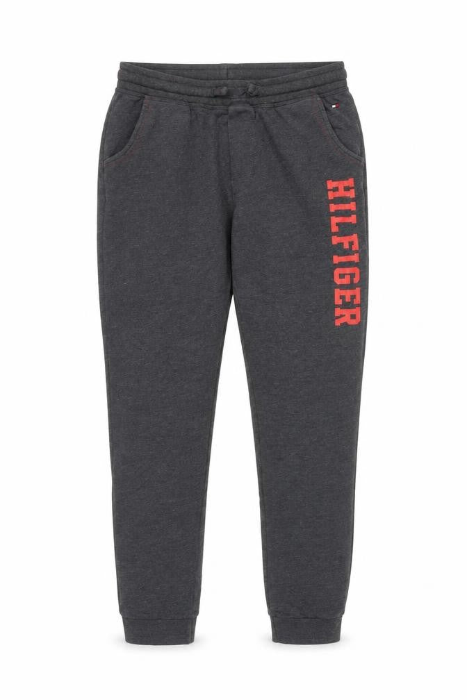 Front view of Tommy Hilfiger boys’ grey jogger trousers 12-14 years